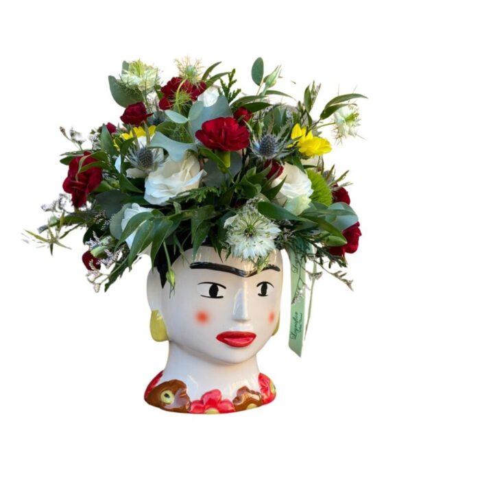 Arreglo Floral en Jarrón con Diseño de Rostro